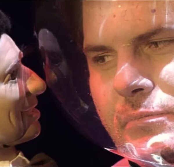 Kristoffer Polaha and Fergus ventriloquist dummy in Mimics film